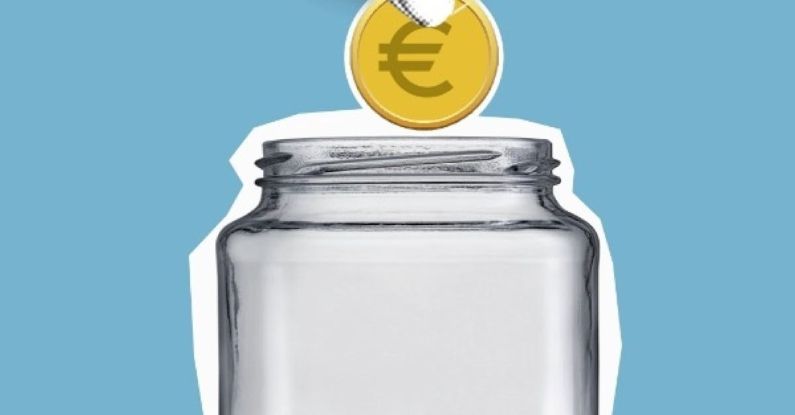Gerber Dime - Crop faceless person putting coin into glass jar
