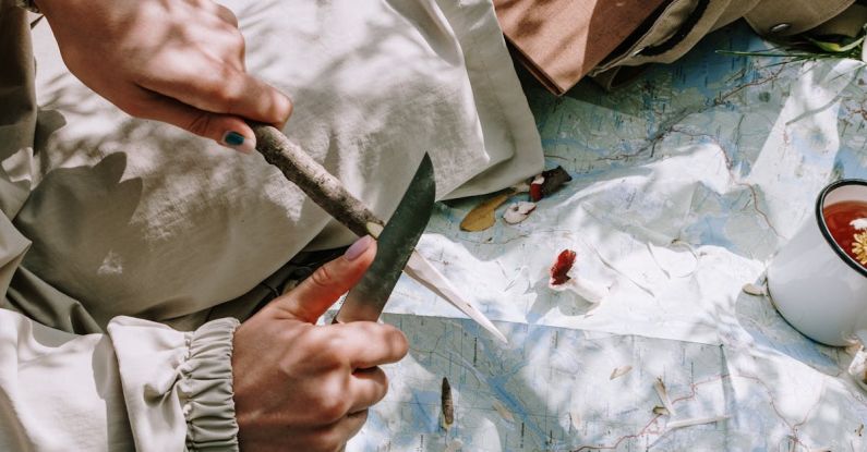 Sharpening - A Person Holding a Knife