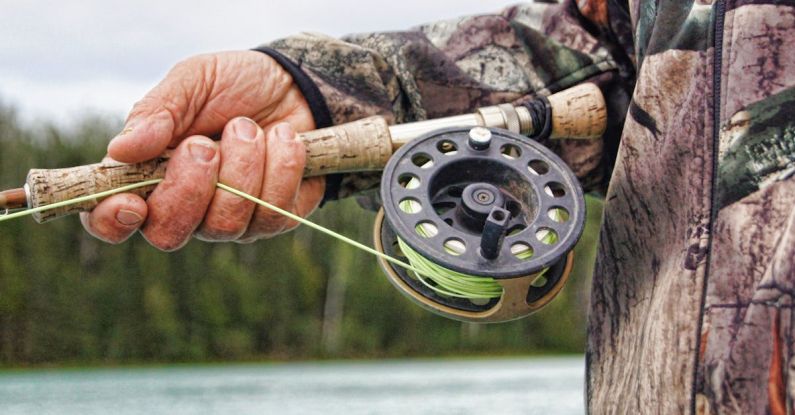 Hunting - Person Holding Fishing Rod