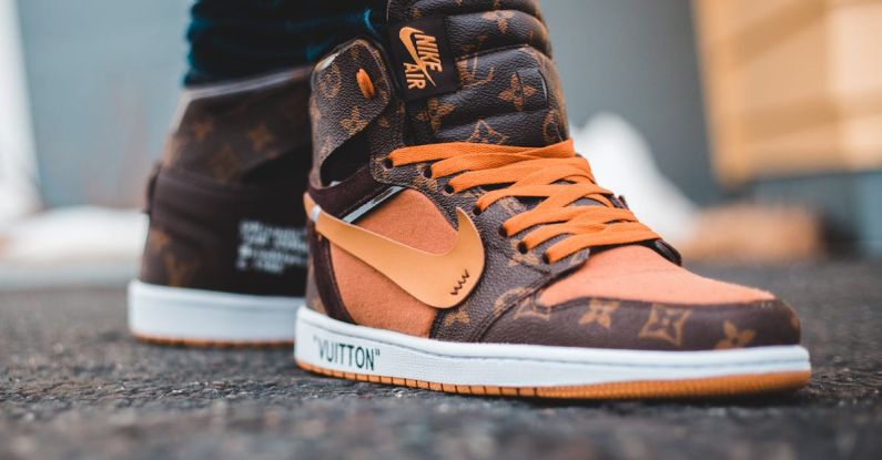 Outdoor Brands - Person Wearing Brown Nike Air Jordan 1 Shoes