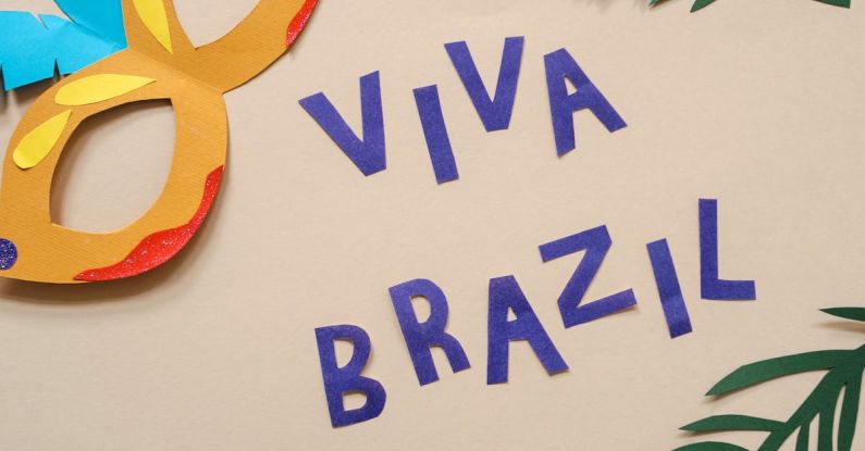 CRKT Viva - Photograph of a Paper Mask Near Letters