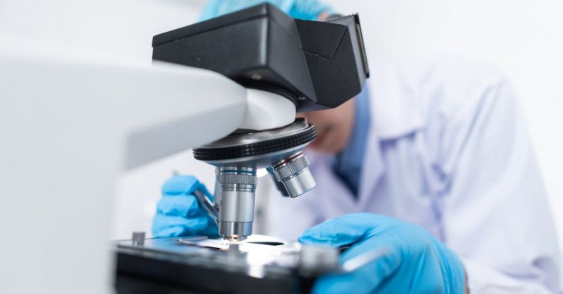 CRKT Technician - Scientist Using Microscope